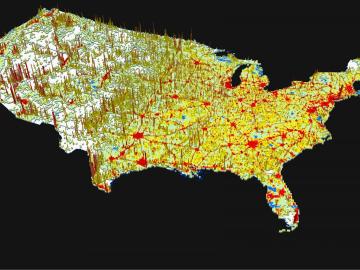 This 3-D visualization represents projected changes in US population between 2010 and 2050 as predicted by a new Oak Ridge National Laboratory model. Areas seen in red indicate higher levels of population growth, whereas the vertical spikes signify popula