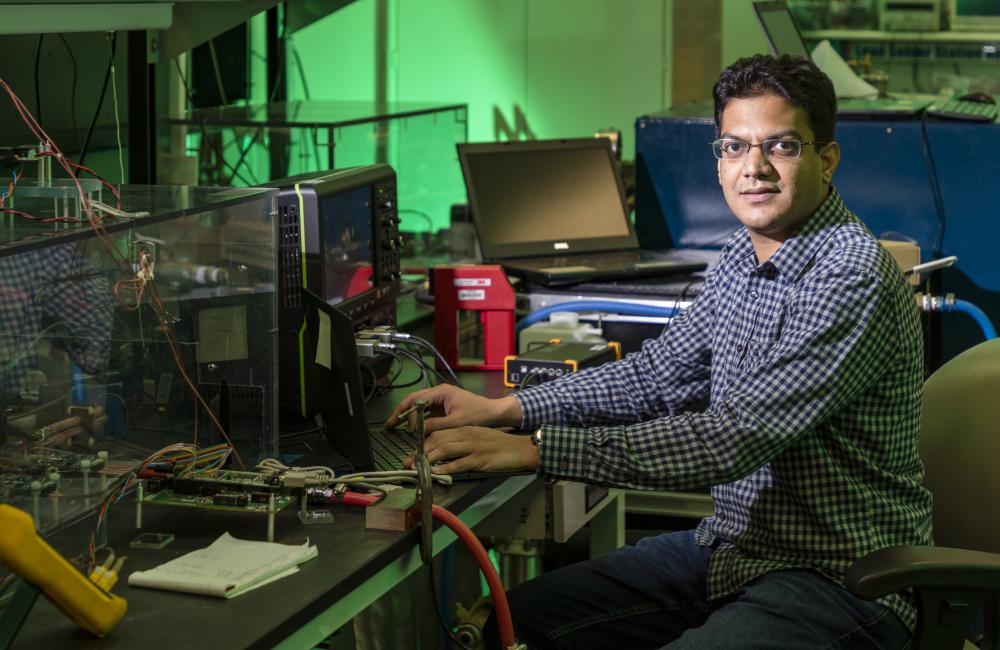 Veda Galigekere is leading Oak Ridge National Laboratory’s work on fast, efficient, wireless charging of electric vehicles. Photos by Carlos Jones, ORNL.