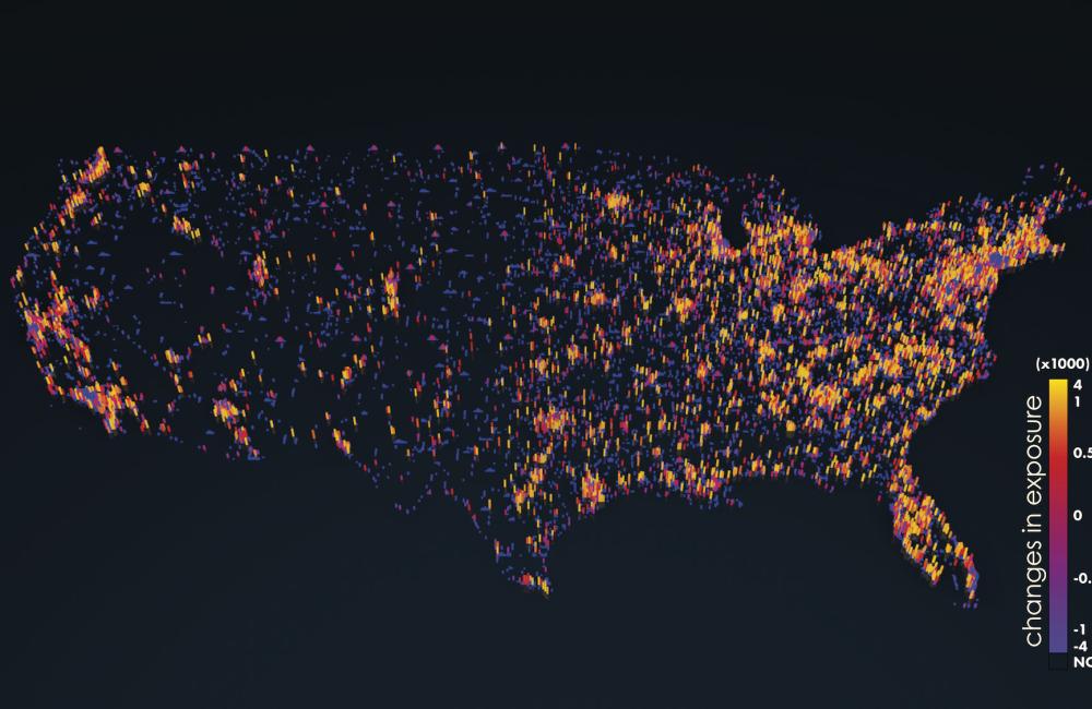 The map displays projected changes in human exposure to extreme climate events at a 1-kilometer scale from 2010 to 2050, which range from minor decreases in rural and suburban areas (blue, purple) to moderate (pink, red) and major (orange, yellow) increases in densely populated urban centers. Image credit: Adam Malin/Oak Ridge National Laboratory, U.S. Dept. of Energy