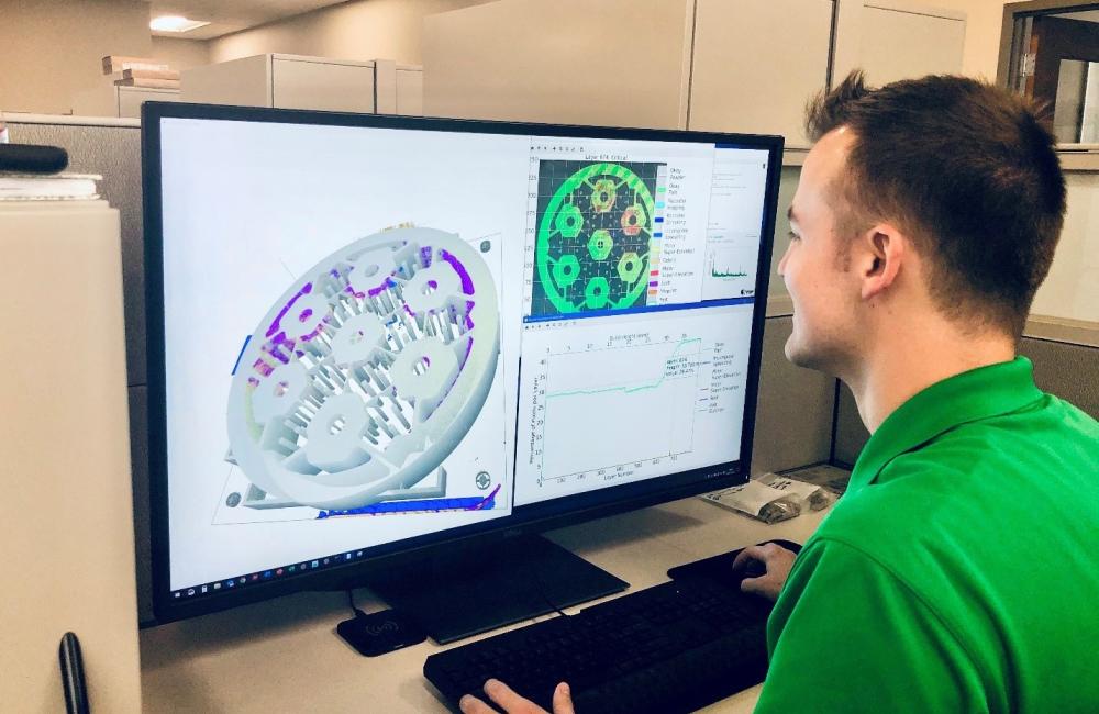 Researcher Chase Joslin uses Peregrine software to monitor and analyze a component being 3D printed at the Manufacturing Demonstration Facility at ORNL. Credit: Luke Scime/ORNL, U.S. Dept. of Energy