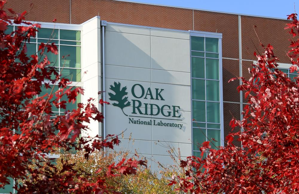 Fall leaves frame ORNL logo.