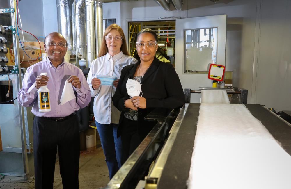 Scientists, from left, Parans Paranthaman, Tina Summers and Merlin Theodore at the DOE’s Carbon Fiber Technology Facility at ORNL are partnering with industry and university to develop antiviral materials for N95 masks. Credit: Genevieve Martin/ORNL, U.S. Dept. of Energy