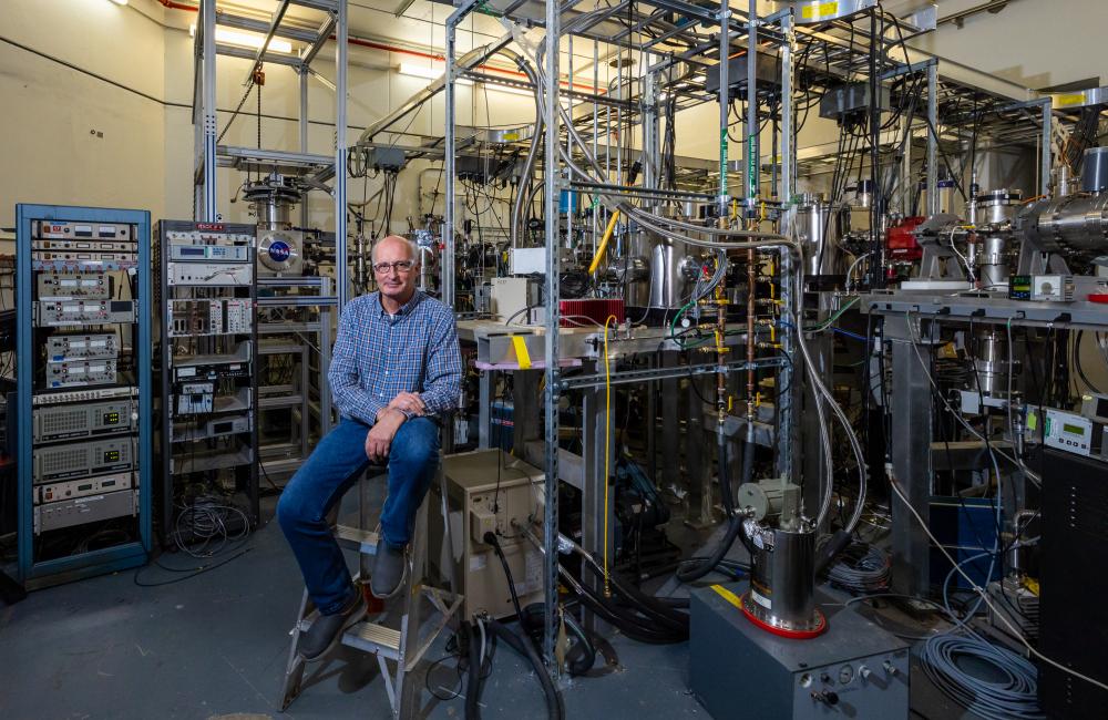 Physicist Charles Havener uses the NASA end station at ORNL’s Multicharged Ion Research Facility to simulate the origin of X-ray emissions from space. Credit: Carlos Jones/ORNL, U.S. Dept. of Energy