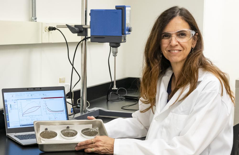 Materials scientist Denise Antunes da Silva researches ways to reduce concrete’s embodied carbon in the Sustainable Building Materials Laboratory at ORNL, a research space dedicated to studying environmentally friendly building materials. Credit: ORNL, U.S. Dept. of Energy