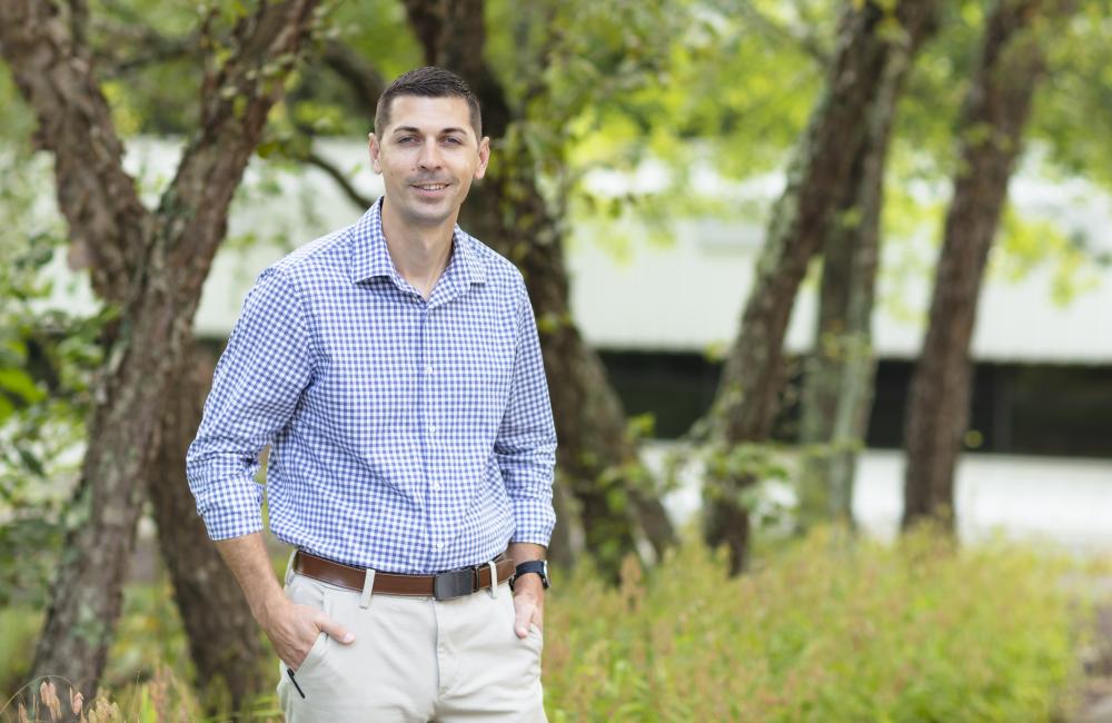 Maj Matt Postupack poses outside at the ORNL campus