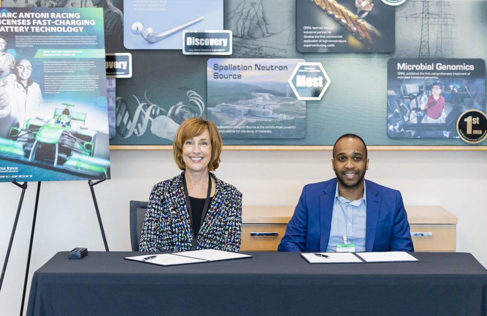 Susan Hubbard, ORNL's deputy for science and technology, and Ricardo Marc-Antoni Duncanson, founder of Marc-Antoni Racing, pose for a photograph during a licensing celebration event on Oct. 17. Credit: Carlos Jones/ORNL, U.S. Dept. of Energy