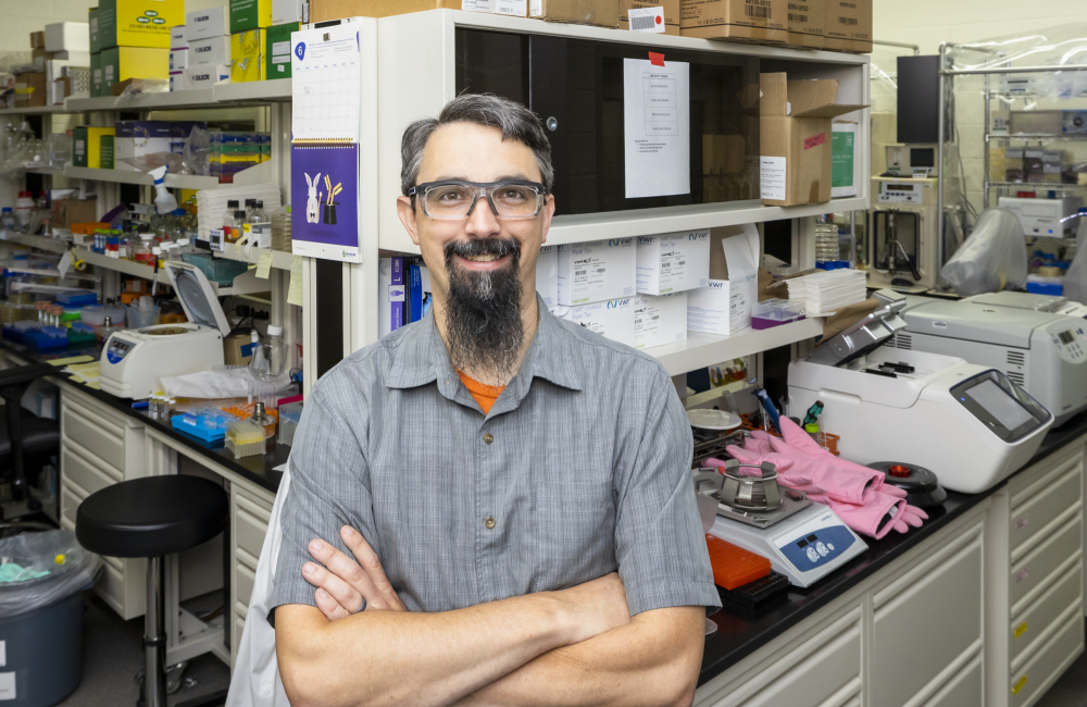 ORNL’s Adam Guss and colleagues used synthetic biology to develop a custom microbe capable of converting deconstructed mixed plastic waste into valuable new materials. Credit: Carlos Jones/ORNL, U.S. Dept. of Energy