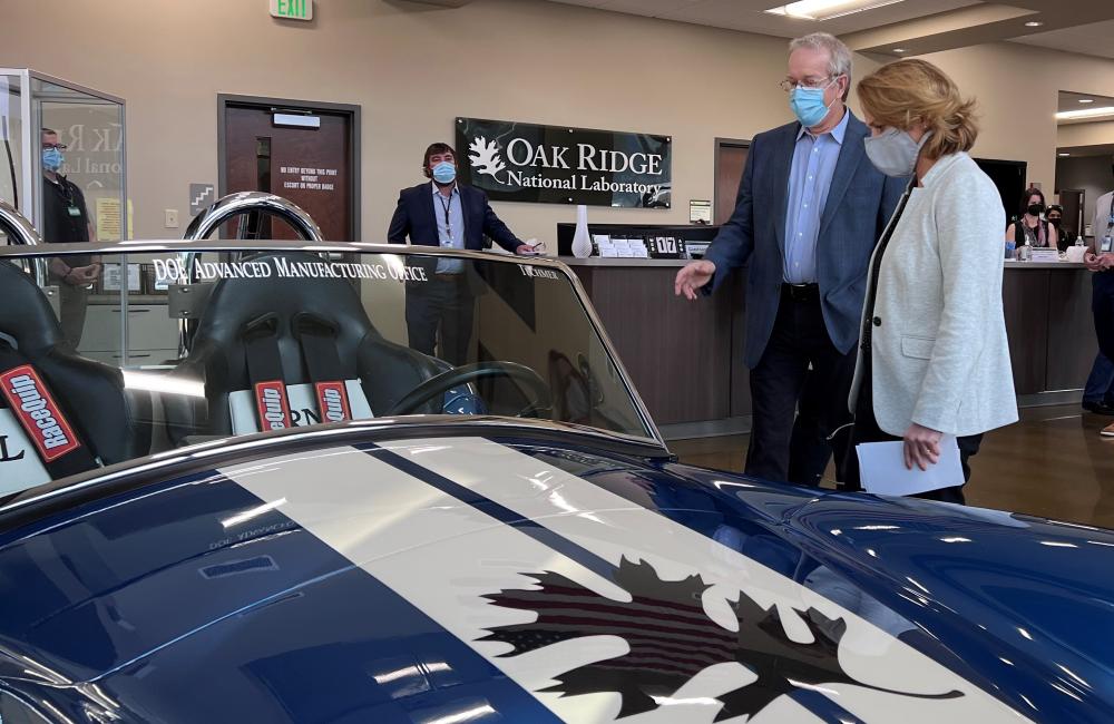 Craig Blue and Director Hicks look at the Shelby printed at the MDF. 