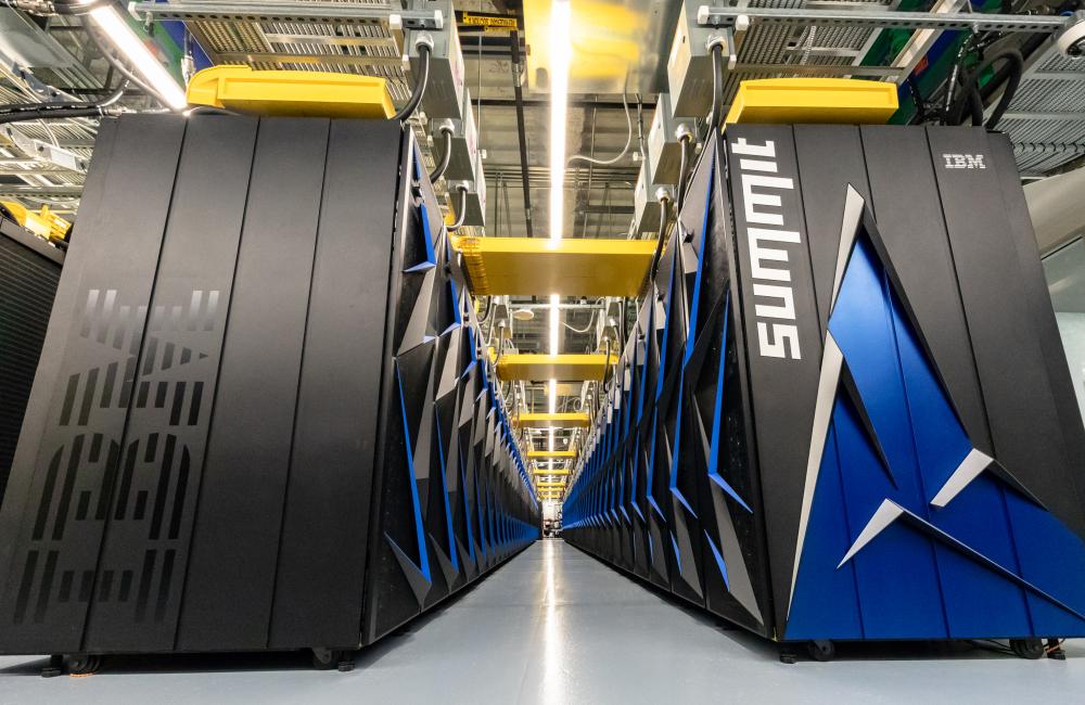 Two end caps of the Summit supercomputer showing the IBM and Summit logos