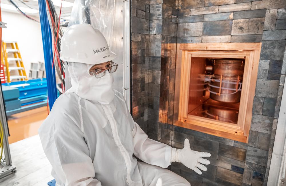 Vincente Guiseppe, co-spokesperson of the Majorana Collaboration and a research staff member at ORNL, in front of the Majorana Demonstrator shield on the 4850 Level of SURF. Credit: Nick Hubbard/Sanford Underground Research Facility