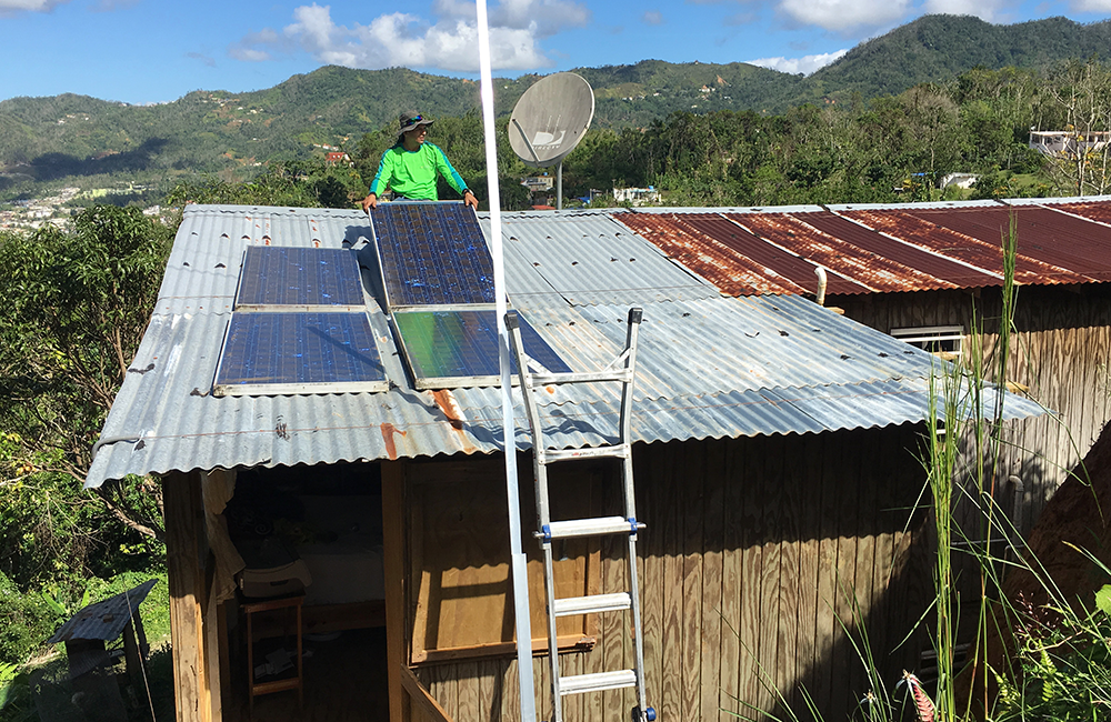 Through the Honnold Foundation and Casa Pueblo, solar panels are installed in Adjuntas, Puerto Rico, and hooked to microgrids with battery storage. ORNL researchers are developing a microgrid orchestrator to manage the microgrids together for increased long-term electrical reliability. Credit: Fabio Andrade