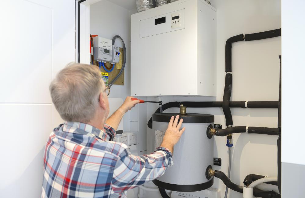 Hot water heater installation. Credit: Getty Images