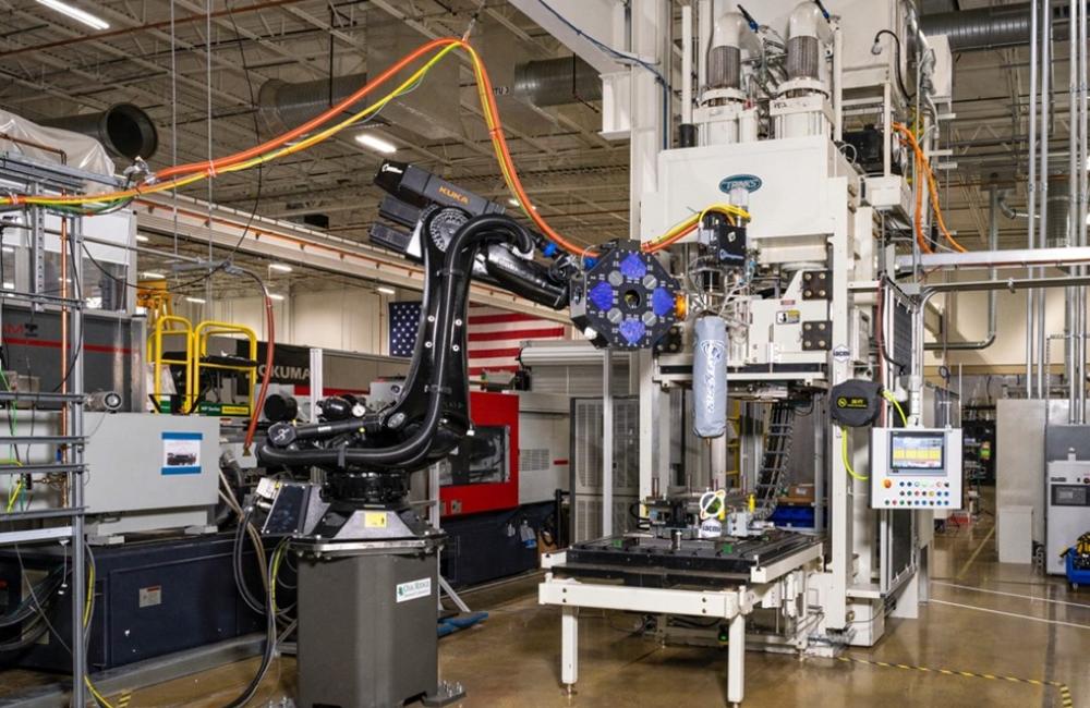 ORNL’s additive manufacturing compression molding, or AMCM, technology can produce composite-based, lightweight finished parts for airplanes, drones or vehicles in minutes and could accelerate decarbonization for the automobile and aerospace industries. Credit: ORNL, U.S. Dept. of Energy