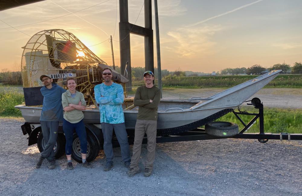 The research team poses in front of the airboat after a long day of research. Credit: ORNL, U.S. Dept. of Energy
