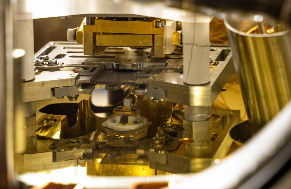 Using the ultrahigh-vacuum atomic force microscope at DOE’s Center for Nanophase Materials Sciences at ORNL, researchers found unique environmentally induced ferroelectric phase transitions in hafnium zirconium oxide, a material important in developing advanced semiconductors. Credit: Arthur Baddorf/ORNL, Dept. of Energy