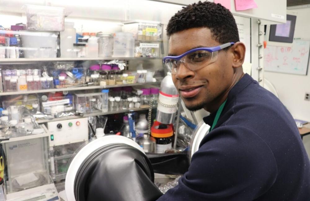 Shantonio Birch working in a glove box