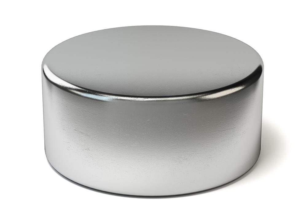Neodymium magnet on white. Adobe Stock