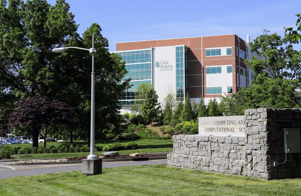 Oak Ridge National Laboratory building and sign for the Computing and Computational Sciences Directorate.