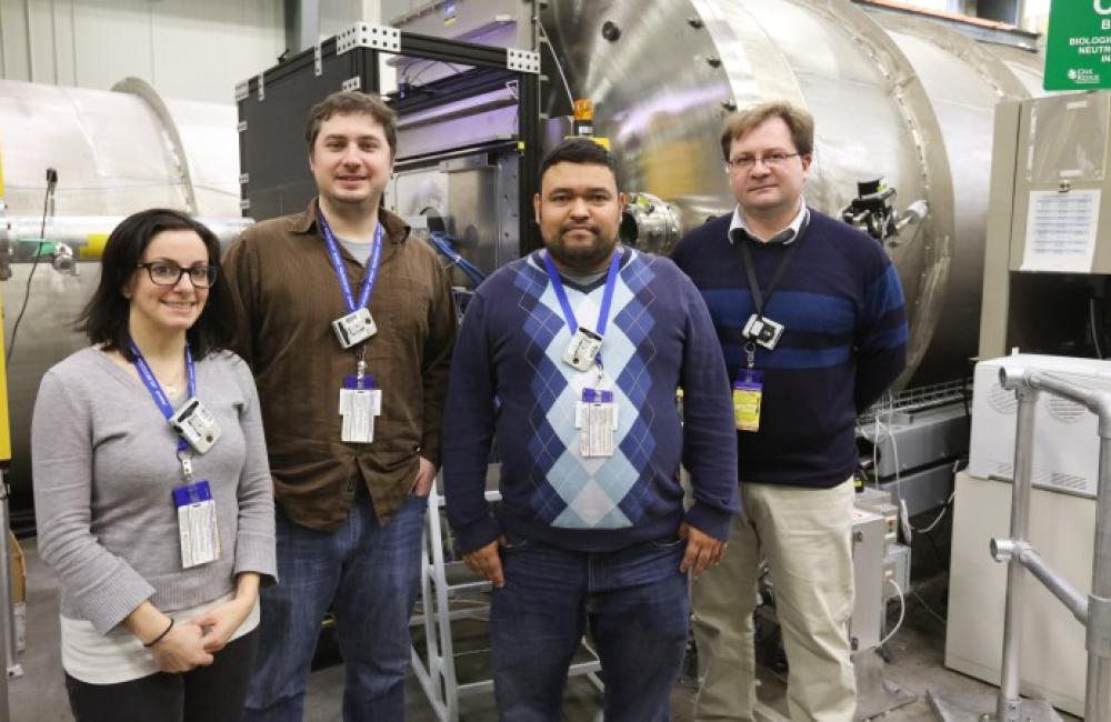 Researchers from NIST and the University of Maryland standing in front of the Bio-SANS equipment. 
