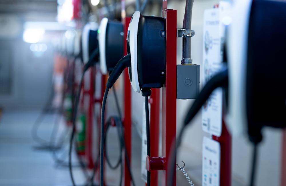 Electric car charging station for charge EV battery. Image from Envato