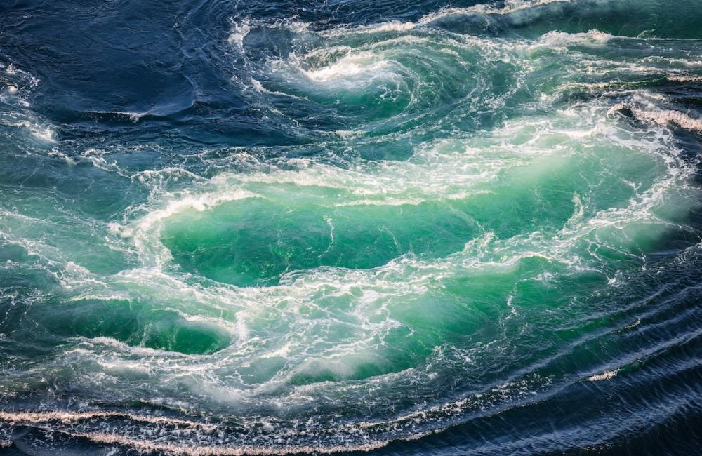 Whirlpools of the maelstrom of Saltstraumen, Nordland , Norway. Image from Envato