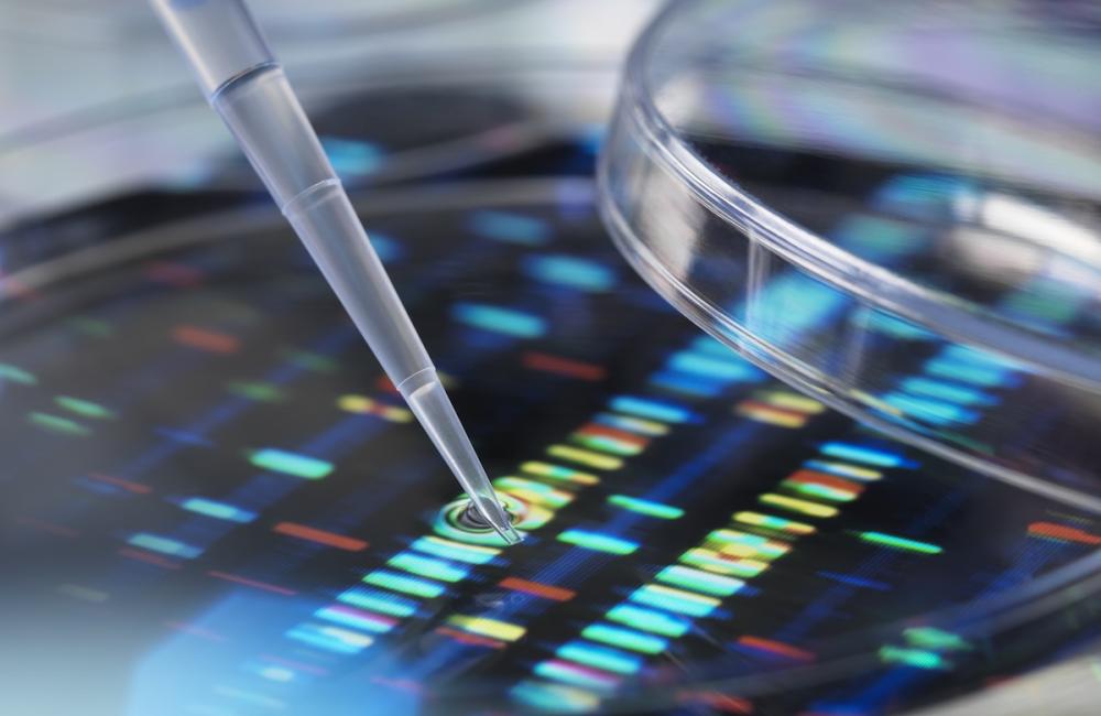 Pipette adding sample to petri dish with DNA profiles in background. Image from Envato