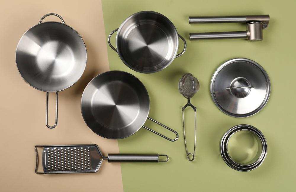 Kitchen utensil on two tone background, top view. Image from Envato