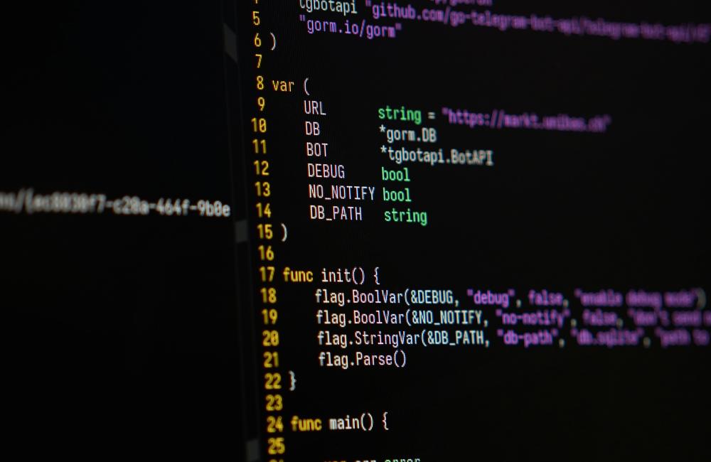 Computer screen displaying programming code in a dark theme with visible text including "github.com" and various function declarations in the Go programming language.