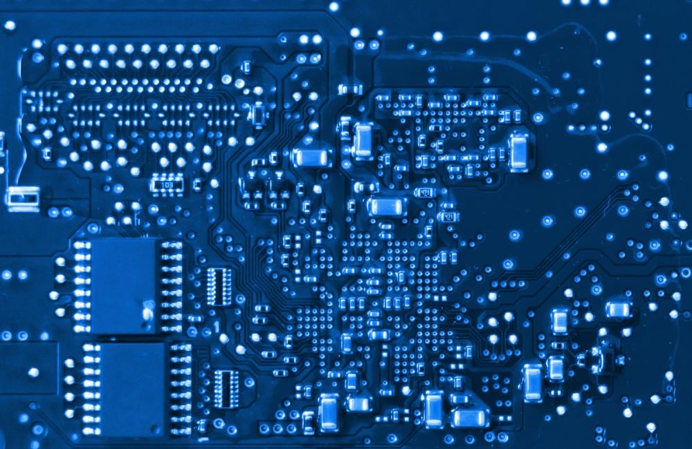 Close up of PCB board and IC chip, Electronic circuit board. Image from Envato