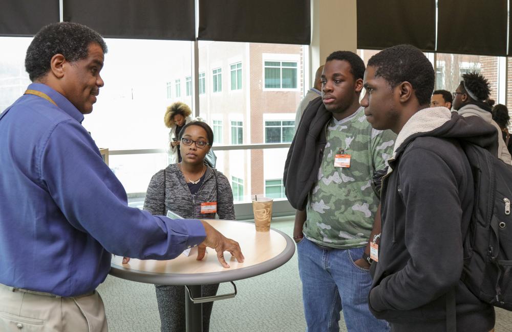 Knox County Commissioner and Oak Ridge National Laboratory Neutron Sciences Directorate employee Sam McKenzie talks to students from Knoxville’s Austin-East High School about career opportunities in science, technology, engineering and math during the