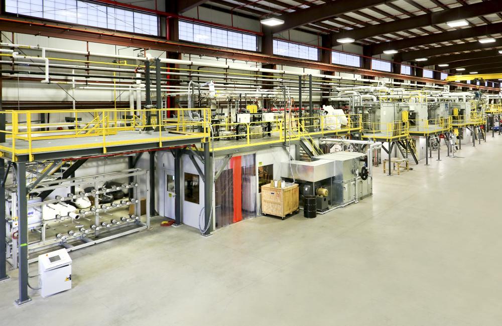 Oak Ridge National Laboratory researchers at the Carbon Fiber Technology Facility have demonstrated a production method that dramatically reduces the cost and energy required to produce carbon fiber.