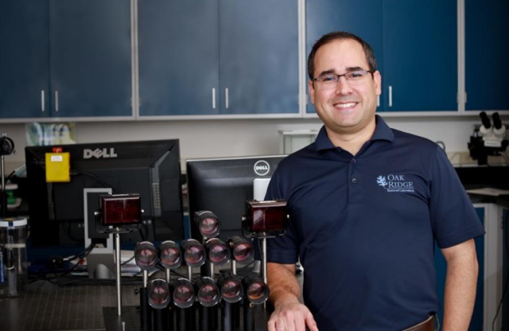 Santos-Villalobos Santos-Villalobos with a camera array in an Imaging, Signals, and Machine Learning lab.