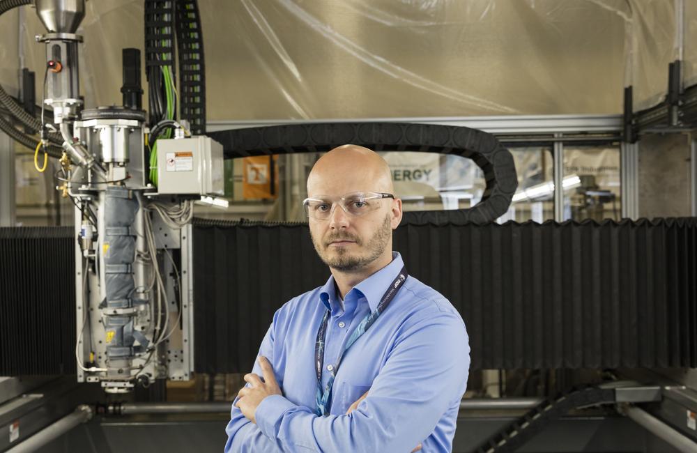 Composites scientist and engineer Vlastimil Kunc with the latest large-scale 3Dprinter at the MDF. Composites scientist and engineer Vlastimil Kunc with the latest large-scale 3Dprinter at the MDF.