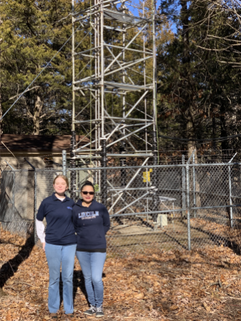 Lincoln University of Missouri students Amy Haslag (left) and Jovita Desha at the Missouri Ozark Ameriflux site, where they will capture data to be modeled with training from ORNL scientists. Credit: Lincoln Univ. of Missouri