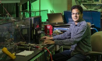 Veda Galigekere is leading Oak Ridge National Laboratory’s work on fast, efficient, wireless charging of electric vehicles. Photos by Carlos Jones, ORNL.