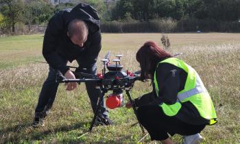 Two pilots train on a LIDAR payload