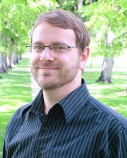 Portrait of Colin with trees in the background