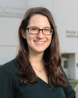 Picture of Krystin Stiefel in front of the HFIR building.