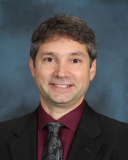A picture of a man wearing a tie