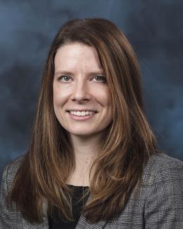 portrait of a white woman with long brown hair