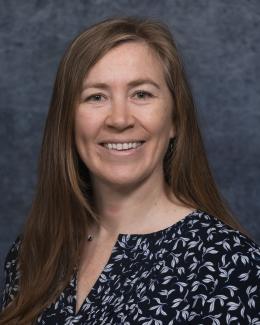 woman in a dark blue and white shirt