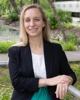 Portrait of Laura H. Arias Chavez standing by the ORNL pond