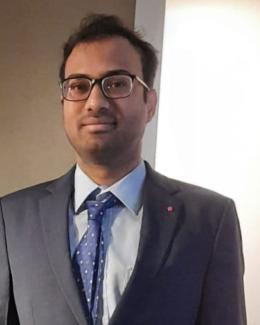 A person wearing suit