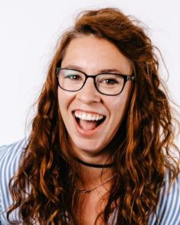 smiling female with long hair