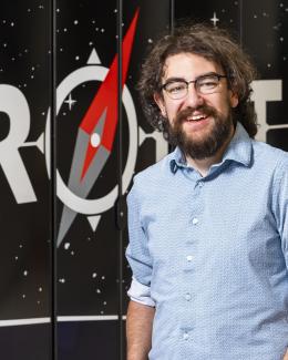 Michael standing in front of OLCF Frontier