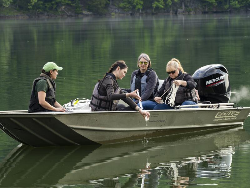 Griffiths and team in boat pulling tests out of the water