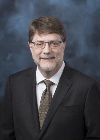 Formal headshot of ORNL Director Stephen Streiffer