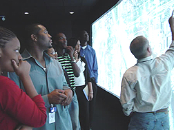 Research Alliance in Math and Science students spend the summer working in ORNL's state of art facilities, such as the EVEREST visualization lab.