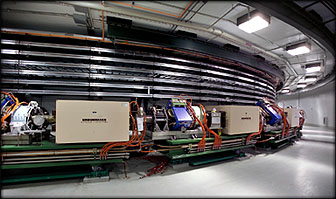 The Spallation Neutron Source's accumulator ring increases the intensity of protons from the linear accelerator 1000-fold before they are sent to the target.