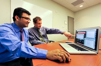ORNL researchers Phani Teja Kuruganti (left) and James Nutaro developed the Radio Channel Simulator software.